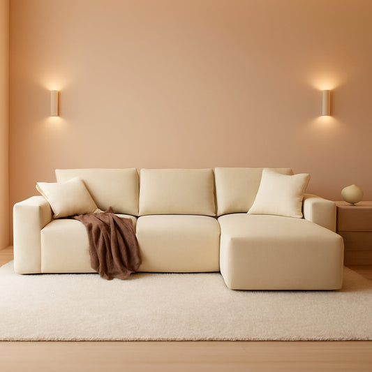 Beige bouclé 136-inch cloud L-shaped sectional sofa in a warm living room