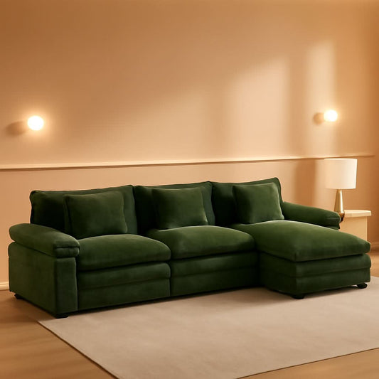 Green chenille 120-inch cloud L-shaped sectional with ottoman in a warm living room