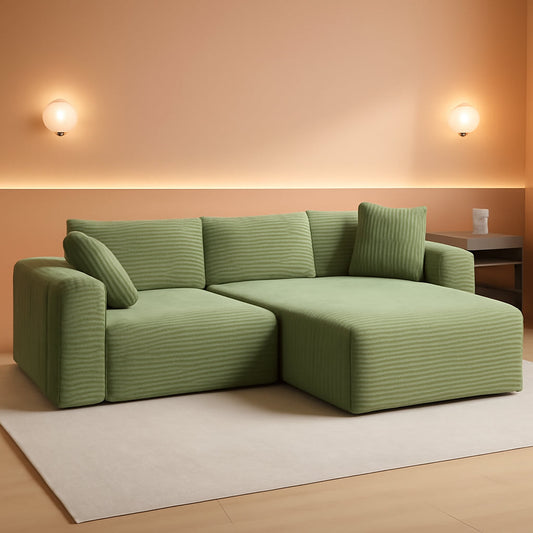 Green 106-inch cloud modular sectional sofa in a warm living room