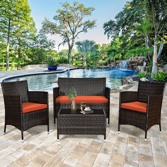 4-Piece Rattan Patio Set with Cushioned Chairs and Glass Table