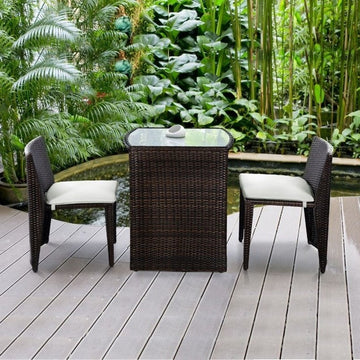 3-Piece Compact Wicker Patio Set with Cushioned Chairs & Glass Table