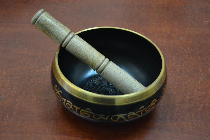 Wooden striker included