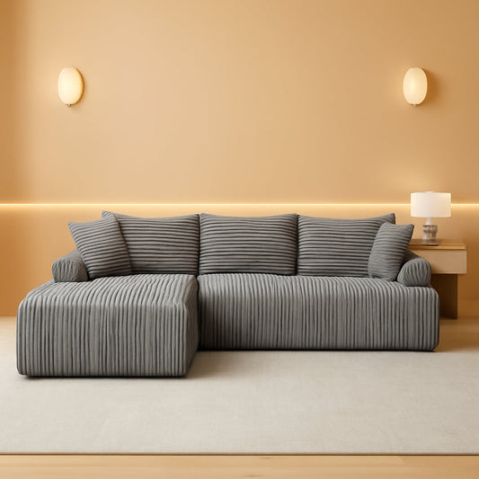 Grey corduroy modular cloud sectional sofa in a warm living room
